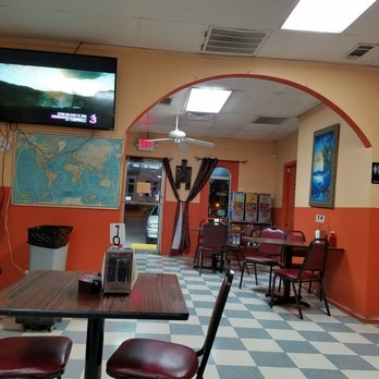 Taqueria El Torito - Her face may be a map of the world but so is their wall - Mexican Near Me - Plano, Texas