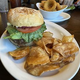10 oz green chili cheese burger with homemade chips and onion rings.
