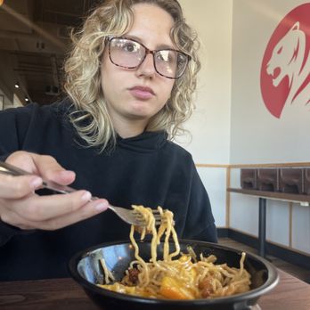 Pei Wei Asian Kitchen - This is my beautiful friend enjoying her orange chicken - Chinese Near Me - Fort Myers, Florida Pei Wei Asian Kitchen - This is my beautiful friend enjoying her orange chicken - Chinese Near Me - Fort Myers, Florida