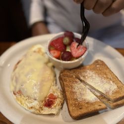 Javier's Café - Crabmeat (real) omelette with tomatoes and swiss cheese