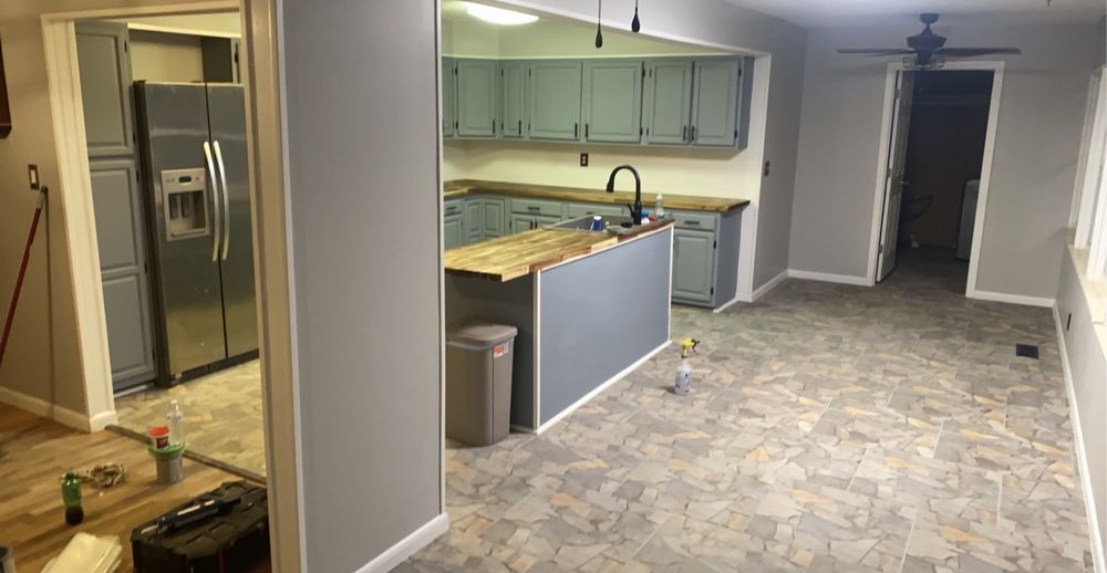 Slide of Anytime Renovation & Drain