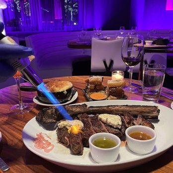 STK Steakhouse Bellevue - Tomahawk steak, Yukon Gold Mashed Potatoes, Parmesan Truffle Fries - Steakhouses Near Me - Bellevue, Washington STK Steakhouse Bellevue - Tomahawk steak, Yukon Gold Mashed Potatoes, Parmesan Truffle Fries - Steakhouses Near Me - Bellevue, Washington