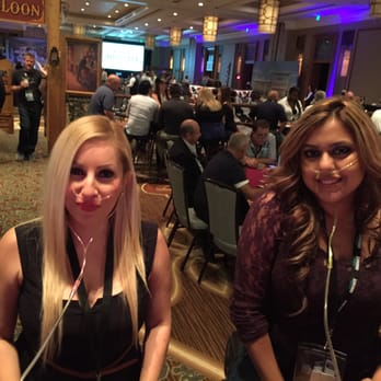O2 Bar Texas - two women sitting at a table - Party Equipment Rentals Near Me - Denton, Texas