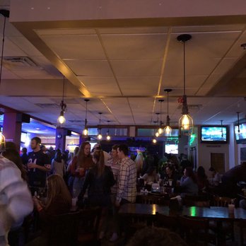 Hurricane Creek Saloon - a crowd of people sitting at tables - Sports Bars Near Me - Melbourne, Florida