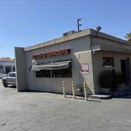 Exterior outside entrance of Butch's Grinders - Side view of the store it's in a retail lot near RCC campus - Riverside, California Exterior outside entrance of Butch's Grinders - Side view of the store it's in a retail lot near RCC campus - Riverside, California