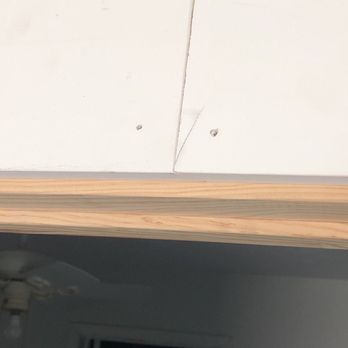 K&J Construction - Framing not painted and holes not filled/painted - Flooring Near Me