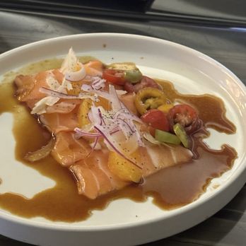 Umi Sushi & Oyster Bar - Salmon carpaccio with orange, fennel, tomatoes, and red onions. - Asian Fusion Near Me - Temecula, California Umi Sushi & Oyster Bar - Salmon carpaccio with orange, fennel, tomatoes, and red onions. - Asian Fusion Near Me - Temecula, California