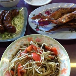 South East Asian BBQ - Lao sausage, BBQ chicken wings and the best papaya by far with a side of sticky rice!