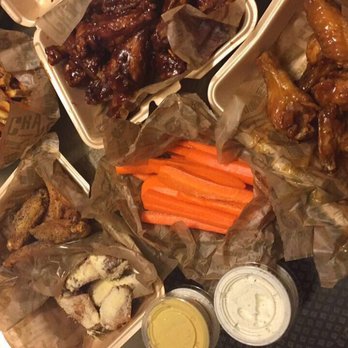 Wingstop - 40-piece Family Pack with carrot sticks and Cajun fries. (Wing flavors: Hickory BBQ, Hawaiian, Lemon Pepper, and Garlic Parmesan) - Chicken Wings Near Me - Stockton, California Wingstop - 40-piece Family Pack with carrot sticks and Cajun fries. (Wing flavors: Hickory BBQ, Hawaiian, Lemon Pepper, and Garlic Parmesan) - Chicken Wings Near Me - Stockton, California