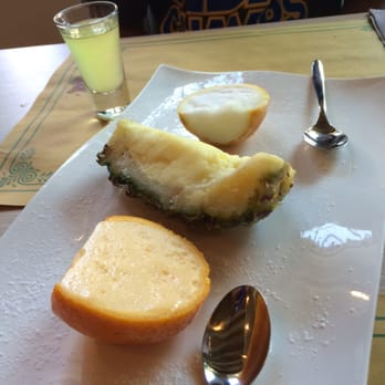 A Beccafico Arte - Orange, pineapple, and lemon sorbet in real hollowed fruit. - Italian Near Me - Venezia, VE A Beccafico Arte - Orange, pineapple, and lemon sorbet in real hollowed fruit. - Italian Near Me - Venezia, VE