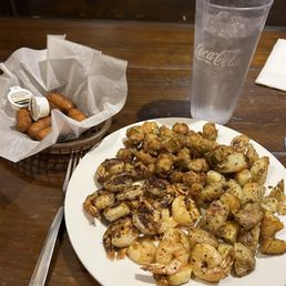 Shrimp platter special with grilled potatoes and fried okra. Plus a side of hush puppies. Shrimp platter special with grilled potatoes and fried okra. Plus a side of hush puppies.
