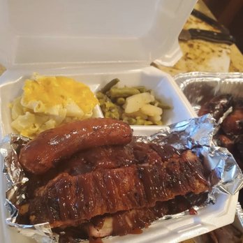 Taste Dat BBQ - a tray of meat and sides - Food Trucks Near Me Taste Dat BBQ - a tray of meat and sides - Food Trucks Near Me