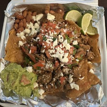 Miguel’s Salsa - Chilaquiles - no egg - added asada. Both green and red salsa half and half. - Mexican Near Me - Clovis, California