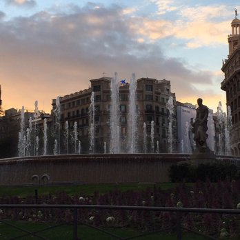 Plaça Catalunya - Fountain at dusk - Landmarks & Historical Buildings Near Me - Barcelona, B Plaça Catalunya - Fountain at dusk - Landmarks & Historical Buildings Near Me - Barcelona, B