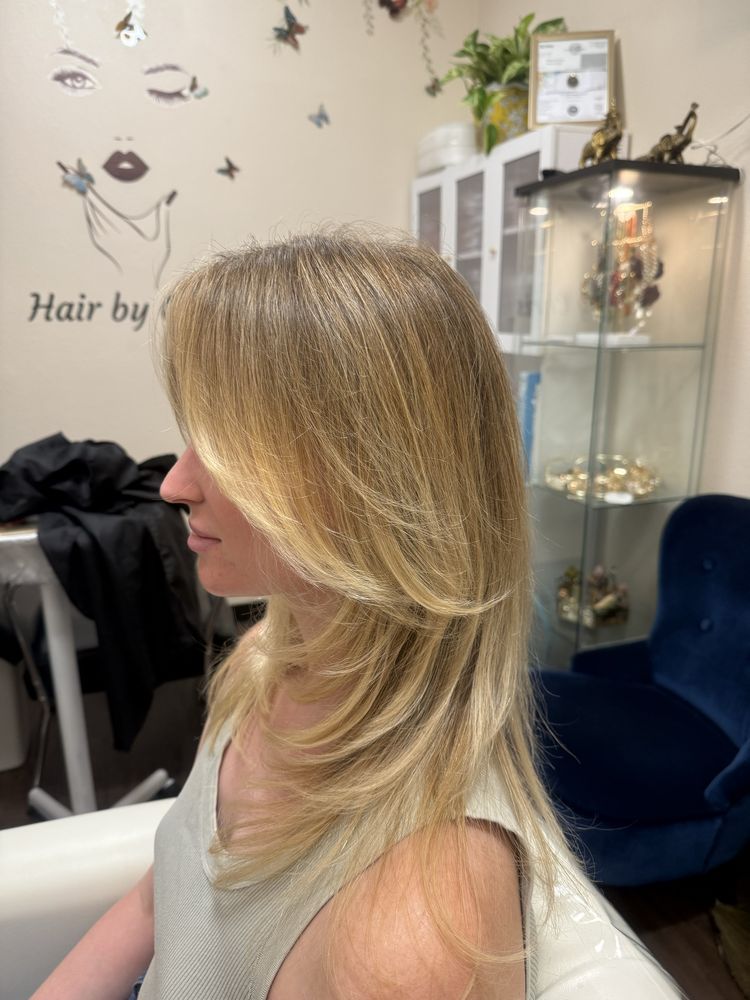 Hair by Christine Logo
