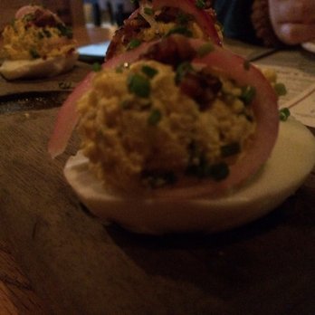 Whiskey Cake Kitchen & Bar - Tasty deviled eggs. Onions add a nice touch. - New American Near Me - Katy, Texas Whiskey Cake Kitchen & Bar - Tasty deviled eggs. Onions add a nice touch. - New American Near Me - Katy, Texas