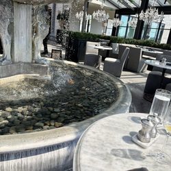 RH Minneapolis | The Gallery in Edina - Seated by the fountain