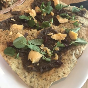 Lucia - Ghouda and onion on cracker. - Italian Near Me - Dallas, Texas Lucia - Ghouda and onion on cracker. - Italian Near Me - Dallas, Texas