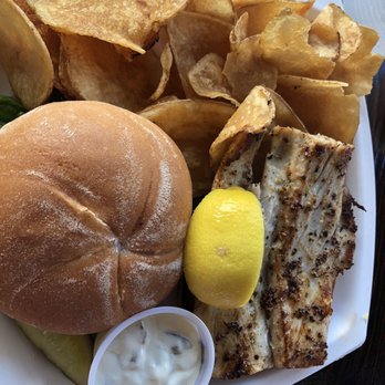 Schooner Wharf Bar - Mahi sandwich grilled with chips - Seafood Near Me - Key West, Florida Schooner Wharf Bar - Mahi sandwich grilled with chips - Seafood Near Me - Key West, Florida