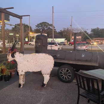 The Salted Goat - Outside (metallic goat in front of a huge smoker) - Gastropubs Near Me - DeBary, Florida The Salted Goat - Outside (metallic goat in front of a huge smoker) - Gastropubs Near Me - DeBary, Florida