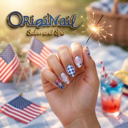 Stunning festive blue and white gel nails with sparkle. Experience high-quality custom nail art at our nail salon in Glen Ellyn IL.