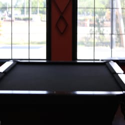Vapology101 Orlando - Enjoy your stay while playing on a 9 footer Connelly professional regulation size 100 inch by 50 inch pool table.