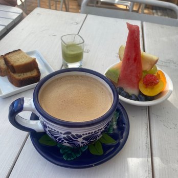 Alejandro - Weekend brunch is served with a shot of one of their smoothies, fresh fruits and some banana bread or corn bread. - Mexican Near Me - Montreal, Quebec