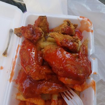 Good Friend - a takeout container of chicken wings and fries - Chinese Near Me - Brooklyn, New York