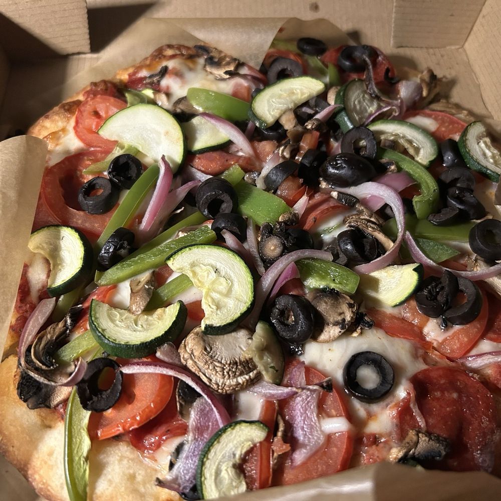 Vegetarian pizza with pepperoni