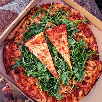 Cheese Board Pizza - House-made tomato sauce, mozzarella, ricotta (?), arugula and lemon vinaigrette - Pizza Near Me - Berkeley, California Cheese Board Pizza - House-made tomato sauce, mozzarella, ricotta (?), arugula and lemon vinaigrette - Pizza Near Me - Berkeley, California