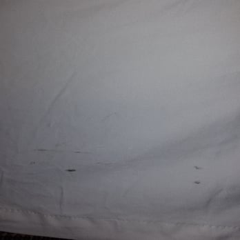 Sheraton Silver Spring Hotel - Bed skirt with holes and black spots all around the entire king size bed. - Hotels Near Me - Silver Spring, Maryland Sheraton Silver Spring Hotel - Bed skirt with holes and black spots all around the entire king size bed. - Hotels Near Me - Silver Spring, Maryland