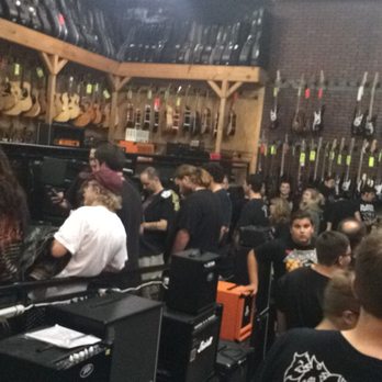 Motor City Guitar - People in line to meet members of anthrax, slayer and death angel. - Musical Instruments & Teachers Near Me - Waterford, Michigan