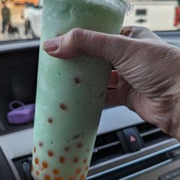 Honeydew Snow with popping peach boba Honeydew Snow with popping peach boba