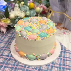 17th Street Bakery - Easter Cake-4 layers-red velvet cake with cream cheese filling, mascarpone buttercream frosting.Eggs were made with tinted white chocolate p