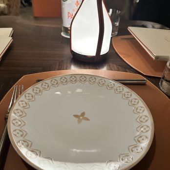 Le Café Louis Vuitton - Monogrammed plate on the table - Cafes Near Me - New York, New York Le Café Louis Vuitton - Monogrammed plate on the table - Cafes Near Me - New York, New York