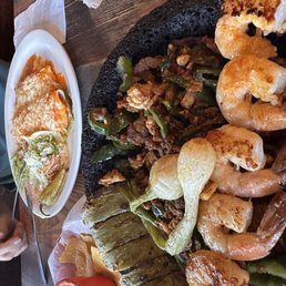 40. Molcajete Sabor a Mexico 40. Molcajete Sabor a Mexico 27. Enchiladas Supreme
