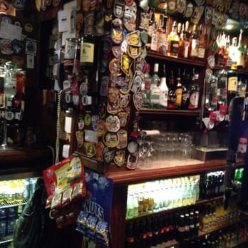 Tig Coili - Police badges around the room - Pubs Near Me - Galway, G Tig Coili - Police badges around the room - Pubs Near Me - Galway, G