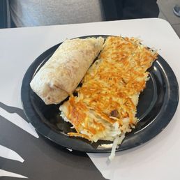 Breakfast burrito with hash browns. So good! Breakfast burrito with hash browns. So good!