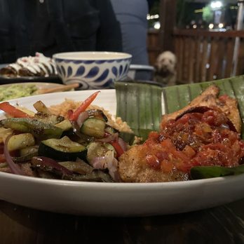 Cocina Hermanas - Red snapper in banana leaf with red rice - Mexican Near Me - Danville, California Cocina Hermanas - Red snapper in banana leaf with red rice - Mexican Near Me - Danville, California