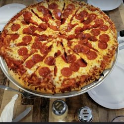 El Fredo Pizza - Pepperoni pizza - best pizza sauce I've tasted anywhere--perfectly golden crust -crispy and tender on the inside...