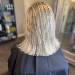 Studio J - Soft blend of color! Lightly layered shoulder length 
bob.
