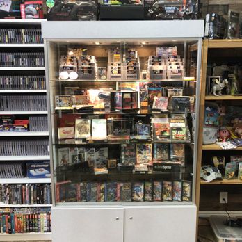 Laughing Crow Collectibles - Heavy hitters! Display cabinet has many rare items - Video Game Stores Near Me - Modesto, California Laughing Crow Collectibles - Heavy hitters! Display cabinet has many rare items - Video Game Stores Near Me - Modesto, California