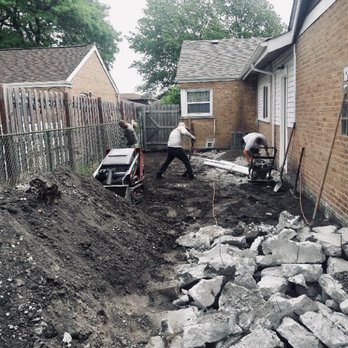 Reds Custom Pavers - Demo of old concrete - Fireplace Services Near Me - Wheeling, Illinois
