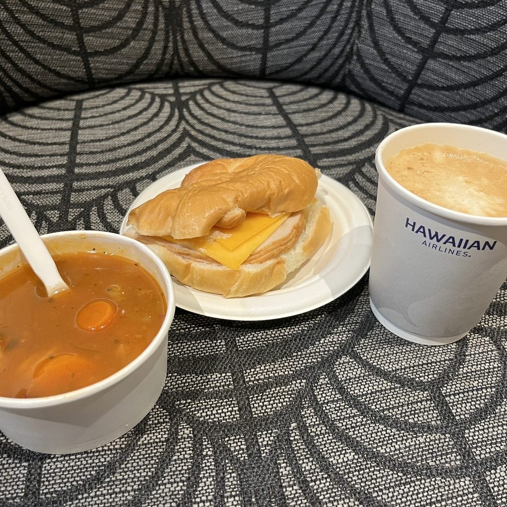 The Plumeria Lounge - Hot Minestrone soup, cold turkey and cheese sandwich and a cafe latte - Airport Lounges Near Me - Honolulu, Hawaii The Plumeria Lounge - Hot Minestrone soup, cold turkey and cheese sandwich and a cafe latte - Airport Lounges Near Me - Honolulu, Hawaii