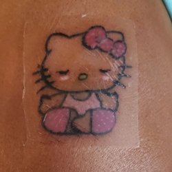 Tattooed Heart Studio - Hello Kitty. My very first day of my Tattoo. I left a Happy customer.