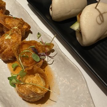 Sei Less - Chicken Wontons (6) & Peking Duck Bao Buns (3) - Chinese Near Me - New York, New York Sei Less - Chicken Wontons (6) & Peking Duck Bao Buns (3) - Chinese Near Me - New York, New York