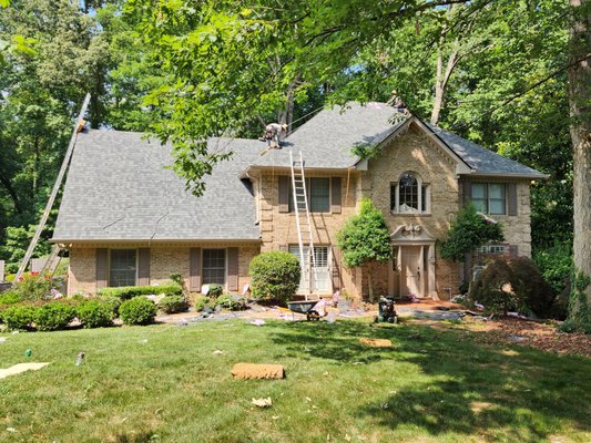 The Roofing Specialists Logo