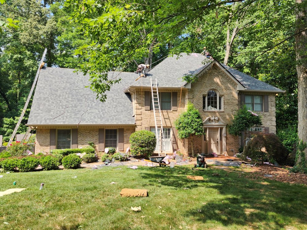 Slide of The Roofing Specialists