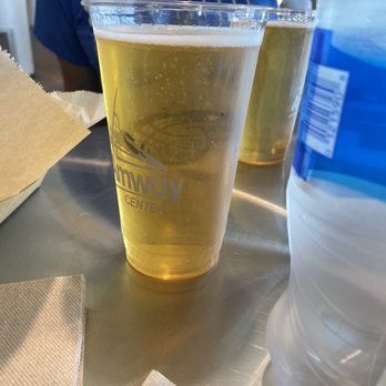 The Carvery - two cups of beer on a table - Barbeque Near Me - Orlando, Florida
