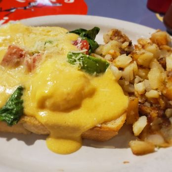 DeLuca's Diner - California Eggs Benedict.  Chicken,  spinach,  avocado and eggs all topped with a delicious hollandaise sauce over Italian bread. - Breakfast & Brunch Near Me - Pittsburgh, Pennsylvania